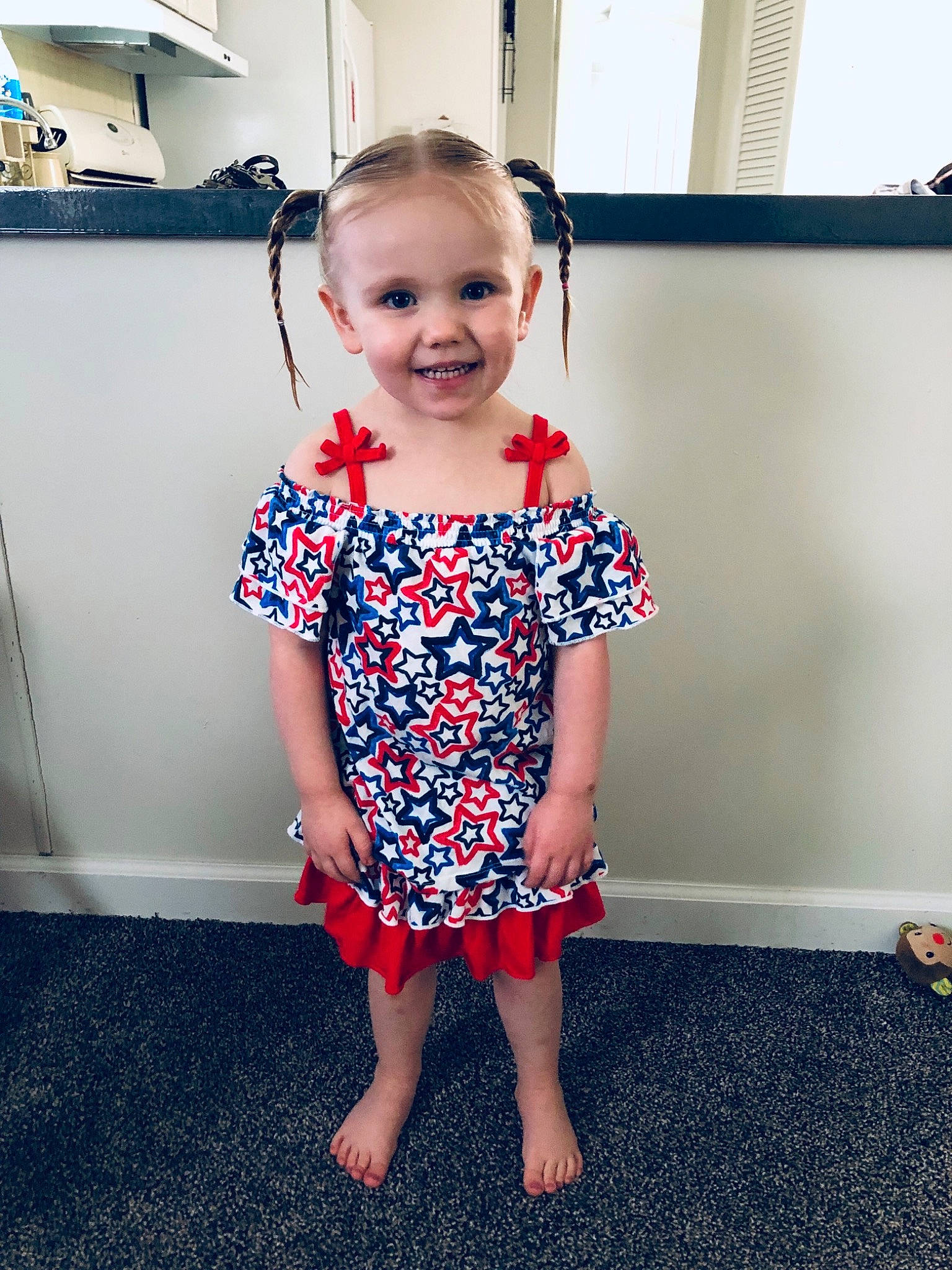 Paisley joined the competition — help win amazing prizes! baby, baby_toddler_clothing, child, clothing, design, dress, face, footwear, head, joy, pattern, person, room, shoe, shoulder, skin, sleeve, smile, standing, t_shirt