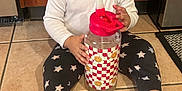 Aurora joined the competition — help win amazing prizes! baby, barefoot, cabinet, checkered_pattern, child, curious_expression, curly_hair, floor, indoor, kitchen, long_sleeve_shirt, person, pink_hair_ties, sitting, smiling_flower, star_pattern_pants, tile_floor, toddler, water_bottle, wooden_cabinet