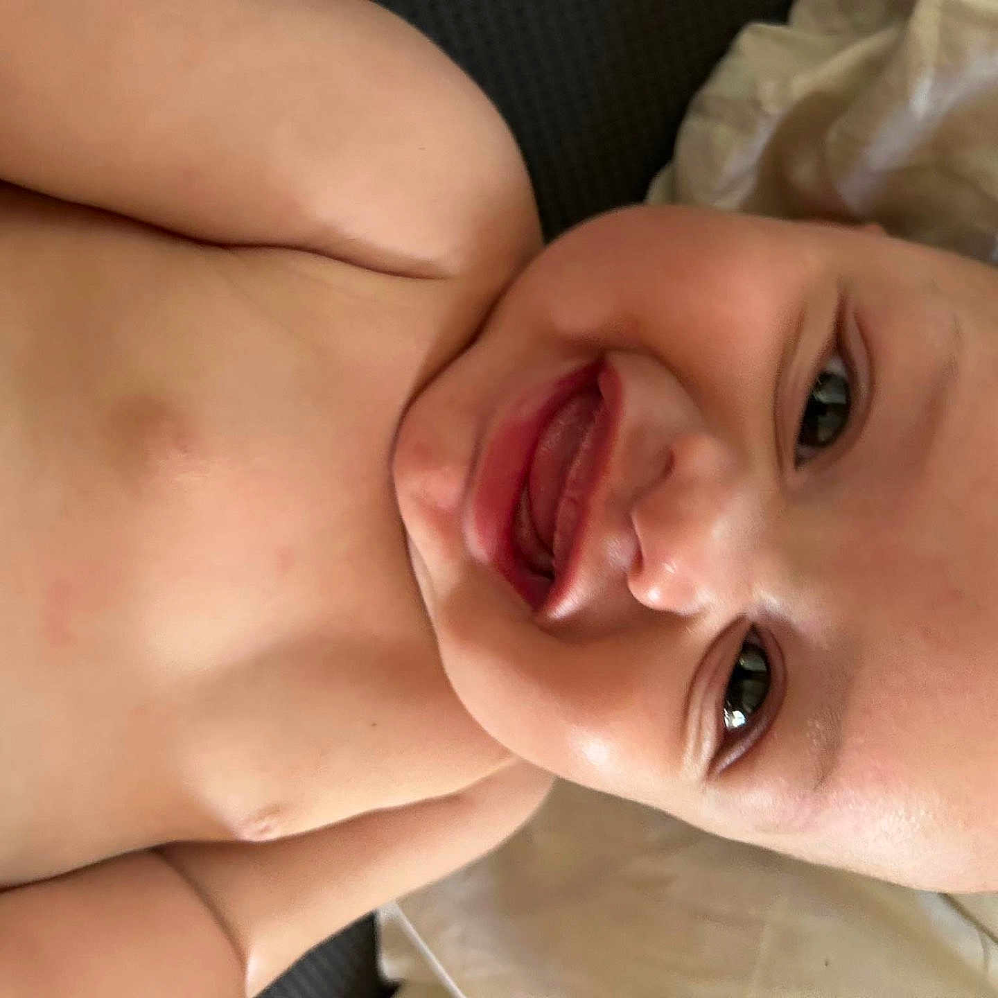 Micah is registered to the contest to win money with this photo: baby, babylaughing, crying, face, happy, head, person, photography, portrait, sad, smile