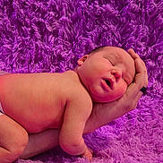 Abigail joined the competition — help win amazing prizes! newborn, baby, infant, sleeping, portrait, close_up, face, hands, arms, adult, blanket, purple, fluffy, cozy, indoors, lying_down, diaper, peaceful, candid, photography