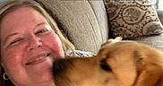 Buddy joined the competition — help win amazing prizes! casual_clothing, close_up, couch, curtains, dog, earrings, face, golden_retriever, happy, home_decor, indoor, lamp, living_room, love, necklace, pet, pillow, smile, text_overlay, woman