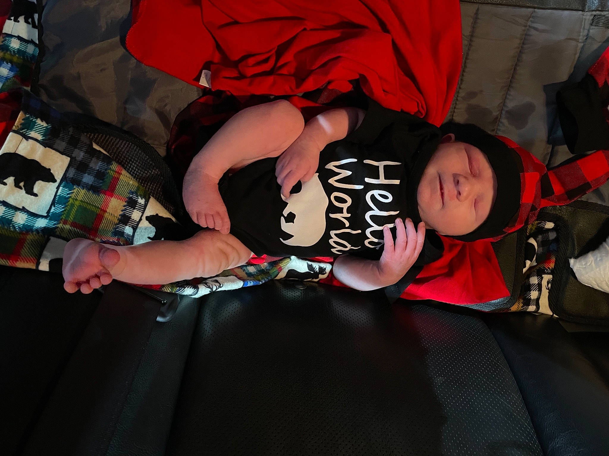 Huntley is registered to the contest to win money with this photo: baby_products, carmine, child, costume, elbow, event, flesh, fun, headwear, pattern, person, room, t_shirt, toddler