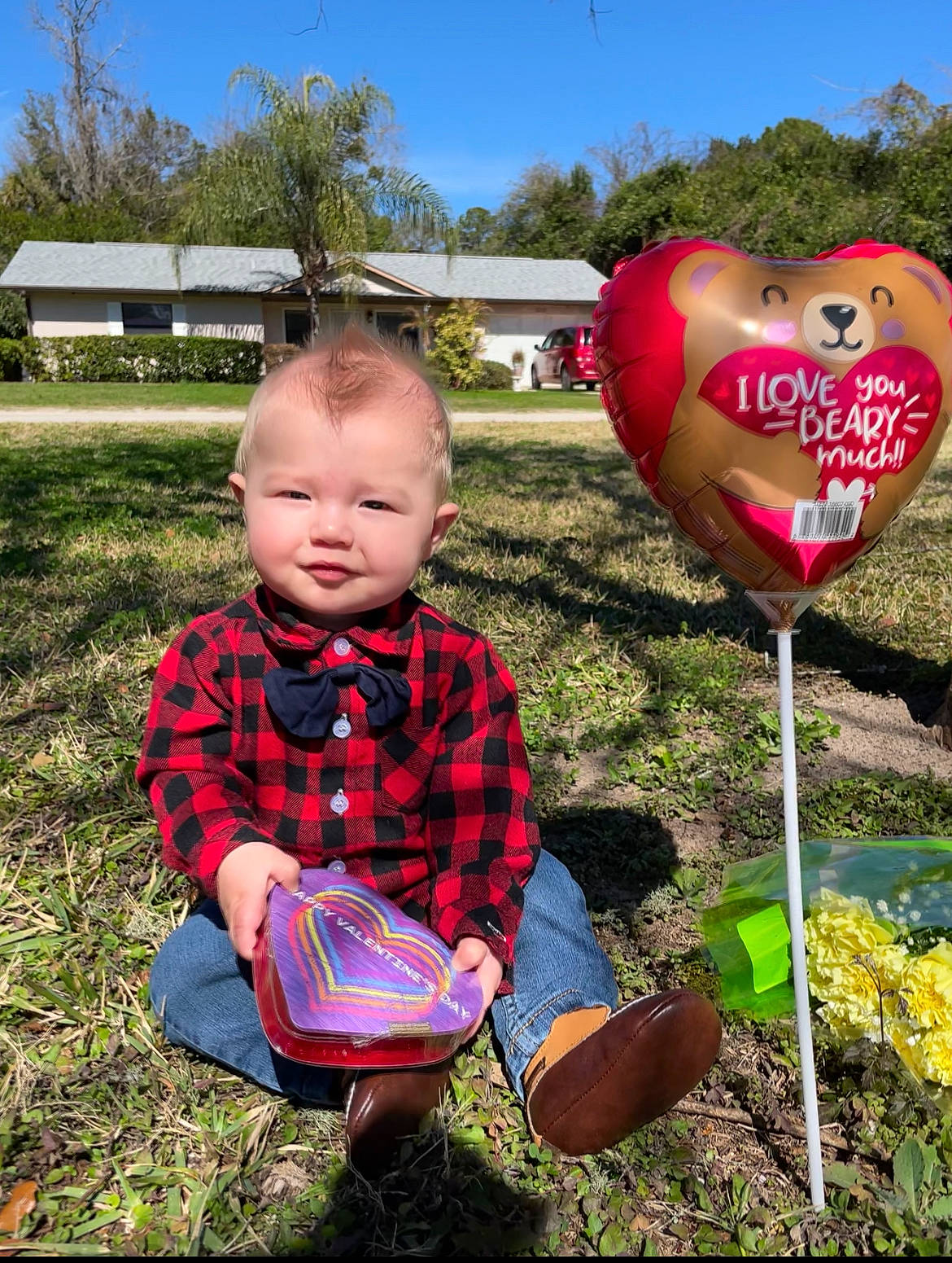 Elisha is registered to the contest to win money with this photo: baby_toddler_clothing, child, facial_expression, fun, grass, grass_family, happy, lawn, leaf, leisure, mammal, people_in_nature, person, plaid, plant, recreation, sky, tartan, toddler, tree