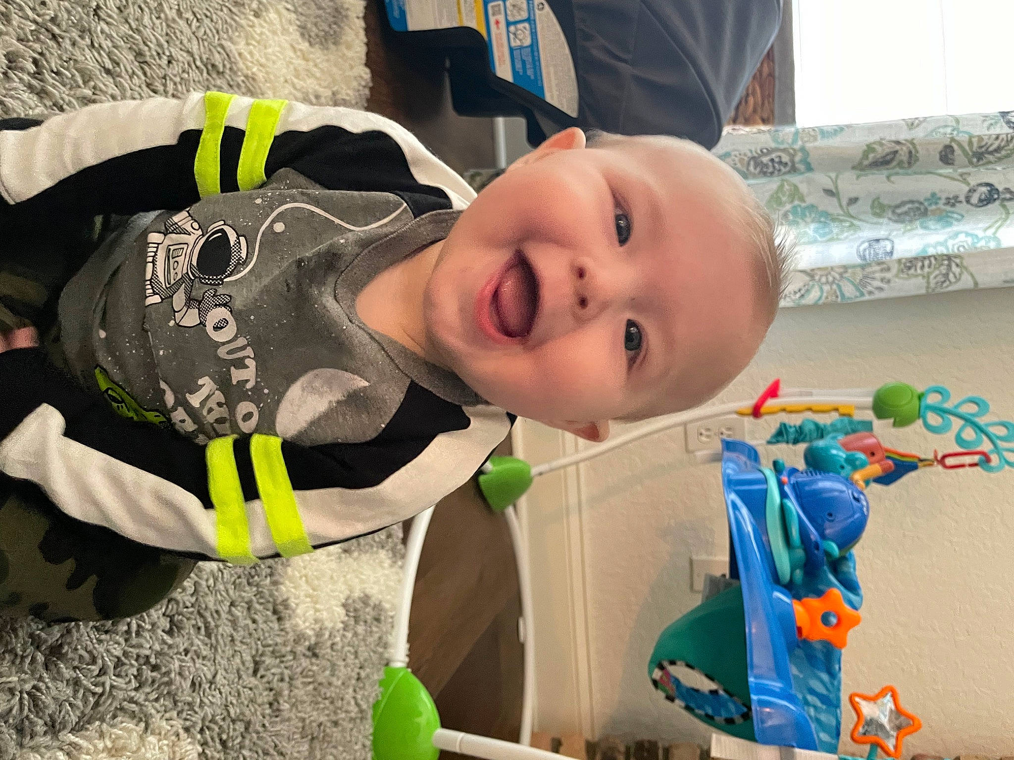 Elisha joined the competition — help win amazing prizes! baby, baby_laughing, baby_products, baby_toddler_clothing, baby_toys, child, fun, grass, green, happy, leisure, person, personal_protective_equipment, plastic, play, smile, toddler, toy, white, wood