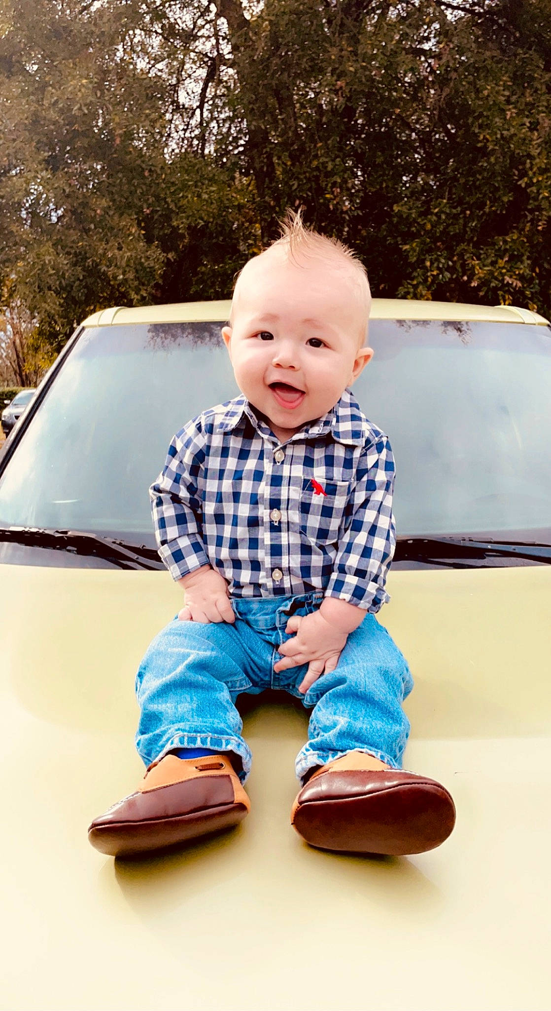 Elisha joined the competition — help win amazing prizes! automotive_design, automotive_exterior, automotive_lighting, car, cool, flash_photography, footwear, fun, happy, hood, outerwear, person, product, shoe, smile, sneakers, standing, tints_and_shades, toddler, tree