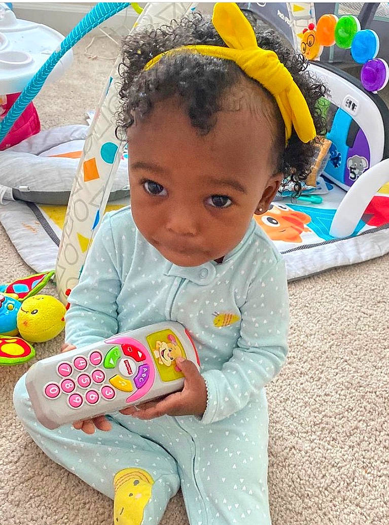 Stori is registered to the contest to win money with this photo: baby, baby_toddler_clothing, beauty, child, event, fun, happy, head, leisure, person, photograph, play, product, recreation, sitting, skin, snapshot, textile, toddler, travel