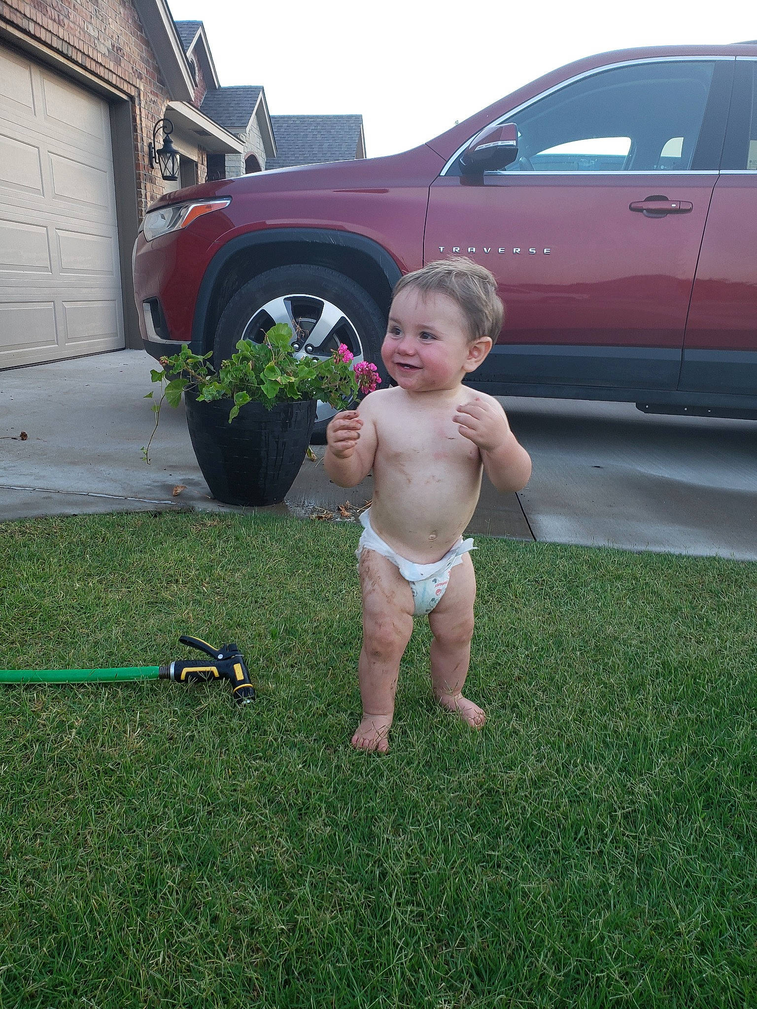 Daxtyn is registered to the contest to win money with this photo: backyard, barechested, car, child, family_car, grass, joy, lawn, male, minivan, person, plant, summer, toddler, vacation, vehicle, vehicle_door, yard