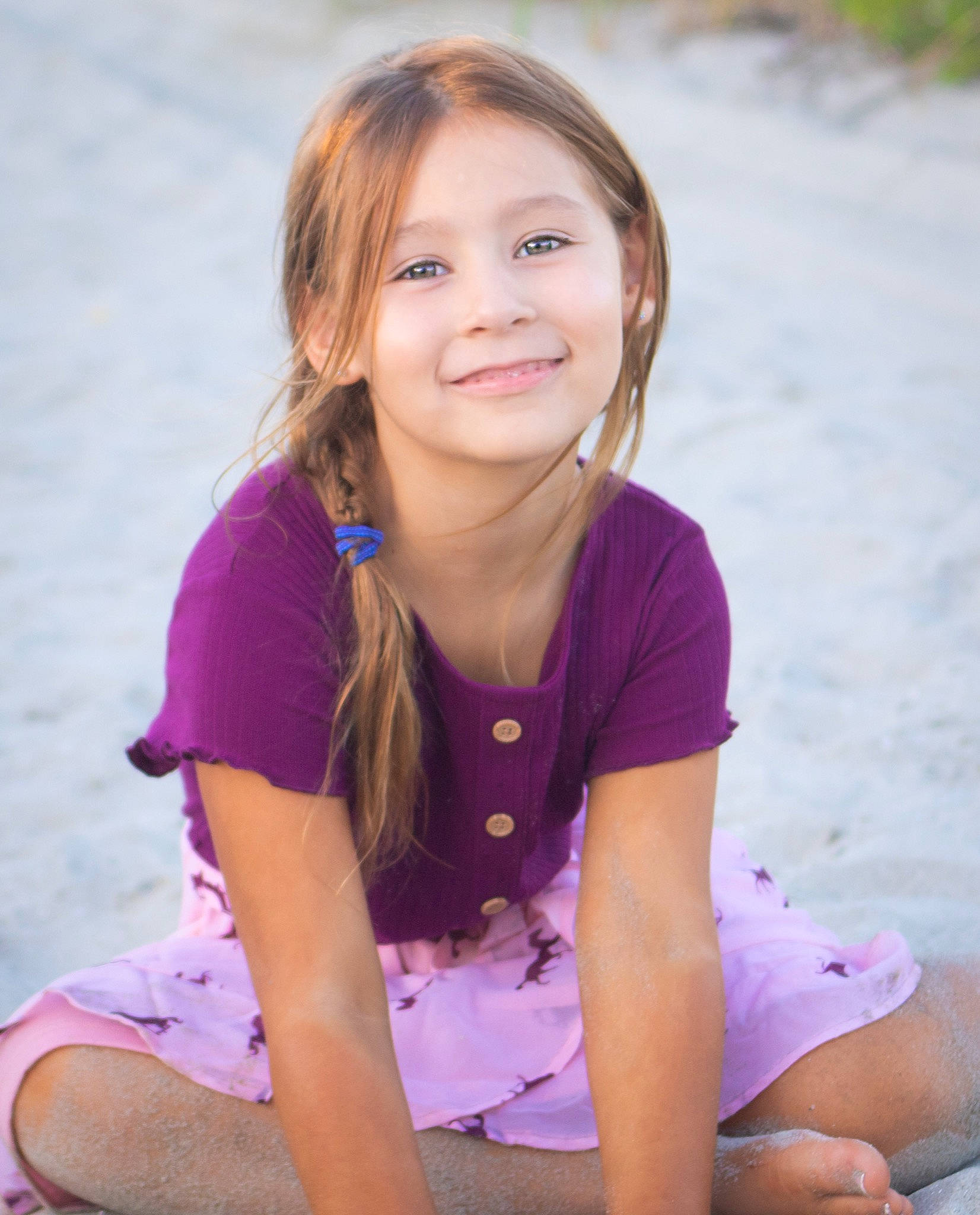 Celina is registered to the contest to win money with this photo: arm, flash_photography, fun, grass, happy, human_leg, joy, knee, leisure, long_hair, magenta, neck, people_in_nature, person, pink, purple, skin, sleeve, smile, summer