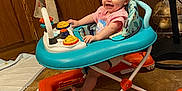 Kadi joined the competition — help win amazing prizes! baby, cabinet, child, clothing, fan, floor, foot, furniture, happy, home, indoor, infant, kitchen, person, play, seat, smiling, tile_floor, toy, walker