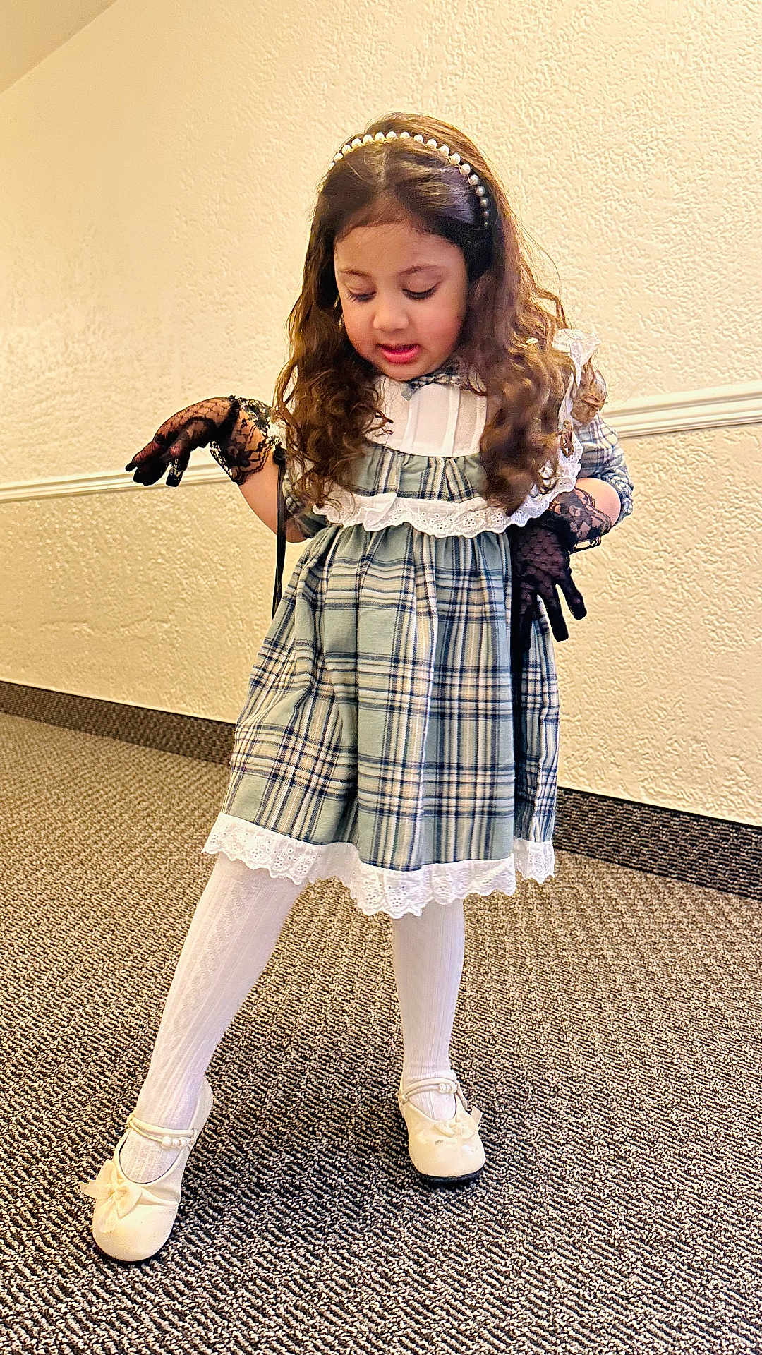 Siyara joined the competition — help win amazing prizes! child, girl, dress, plaid, lace, white_tights, shoes, black_gloves, headband, pearl, curly_hair, carpet, indoor, wall, floor, pose, person, fashion, cute, playful