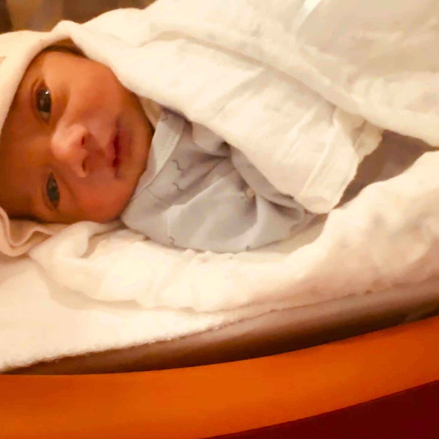 Sihan is registered to the contest to win money with this photo: baby, bed, blanket, closeup, cozy, cute, face, hat, indoors, infant, newborn, person, portrait, resting, sleep, sleepwear, soft, warm, wrapped, young_child