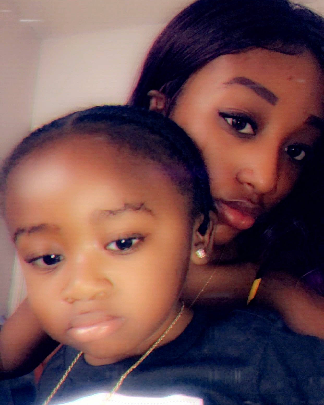 Ty'Lan is registered to the contest to win money with this photo: beauty, black_hair, cheek, child, cool, eye, eyebrow, face, forehead, fun, hair, hairstyle, head, lip, mother, nose, person, photography, selfie, skin