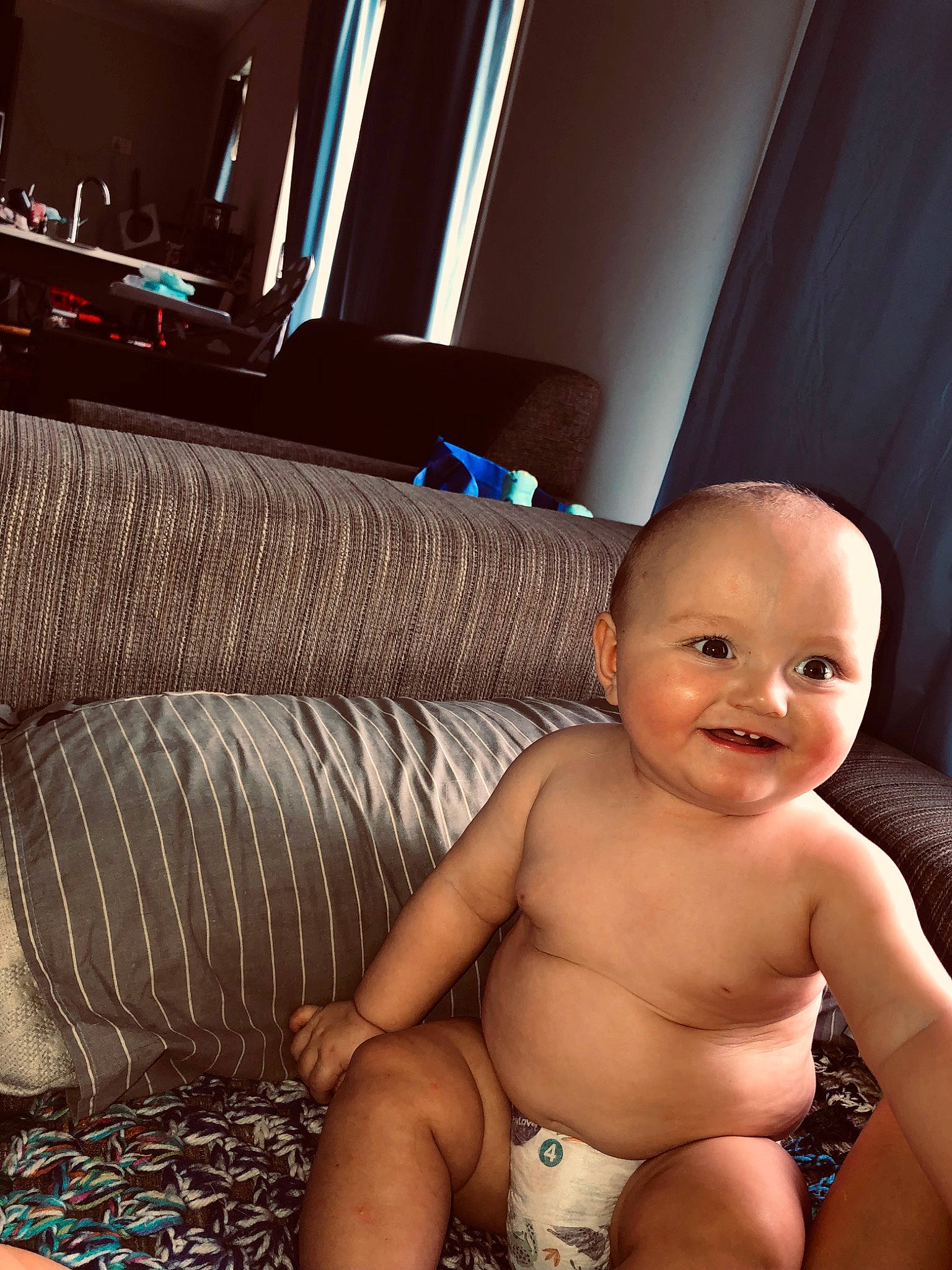 Josiah joined the competition — help win amazing prizes! abdomen, baby, barechested, bathing, chest, comfort, couch, finger, flooring, foot, fun, happy, human_leg, joy, person, room, smile, stomach, thigh, thumb