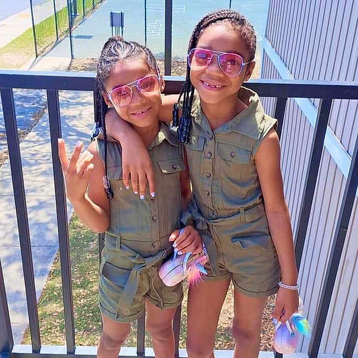 Je'Veah is registered to the contest to win money with this photo: accessories, baby, clothing, earring, face, female, fence, girl, glasses, head, jewelry, military, militaryuniform, person, photography, portrait, shorts, soldier, sunglasses, teen