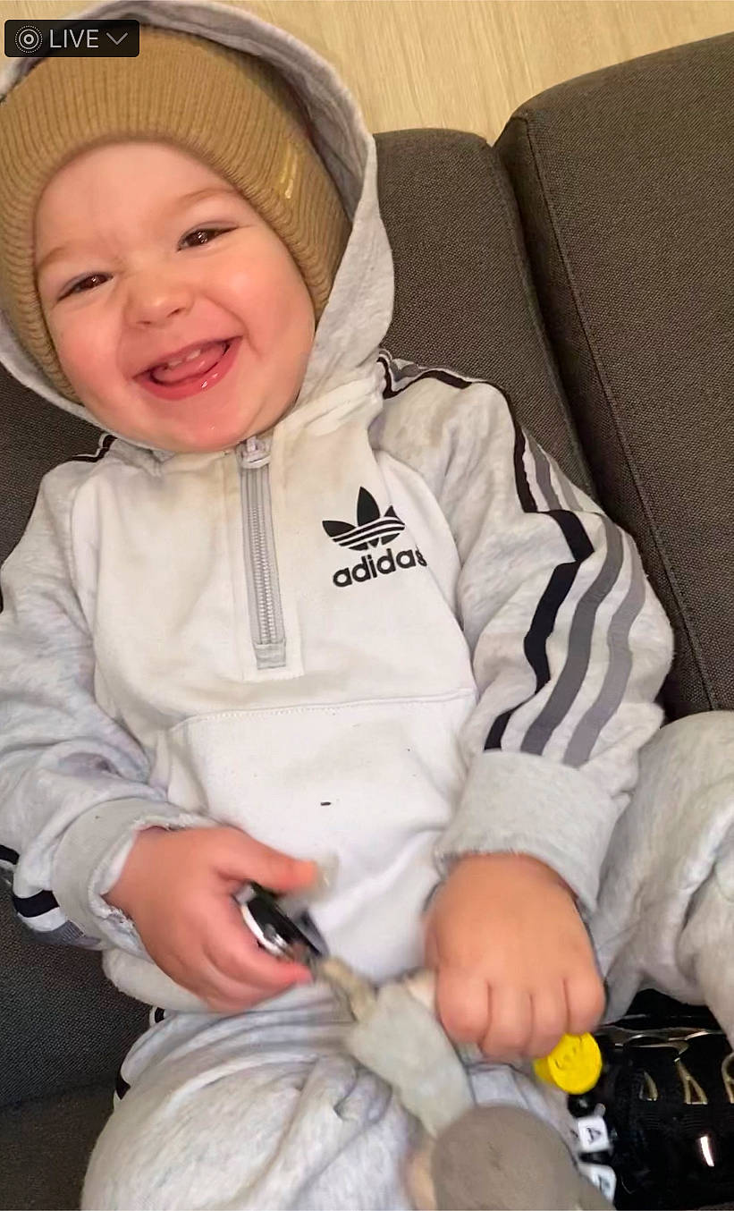 Aaron a rejoint le concours — aidez-le/la à gagner de superbes lots ! baby, baby_laughing, baby_toddler_clothing, cheek, child, comfort, eye, happy, headwear, human_body, jacket, joy, knee, mouth, nose, organ, person, skin, sleeve, smile