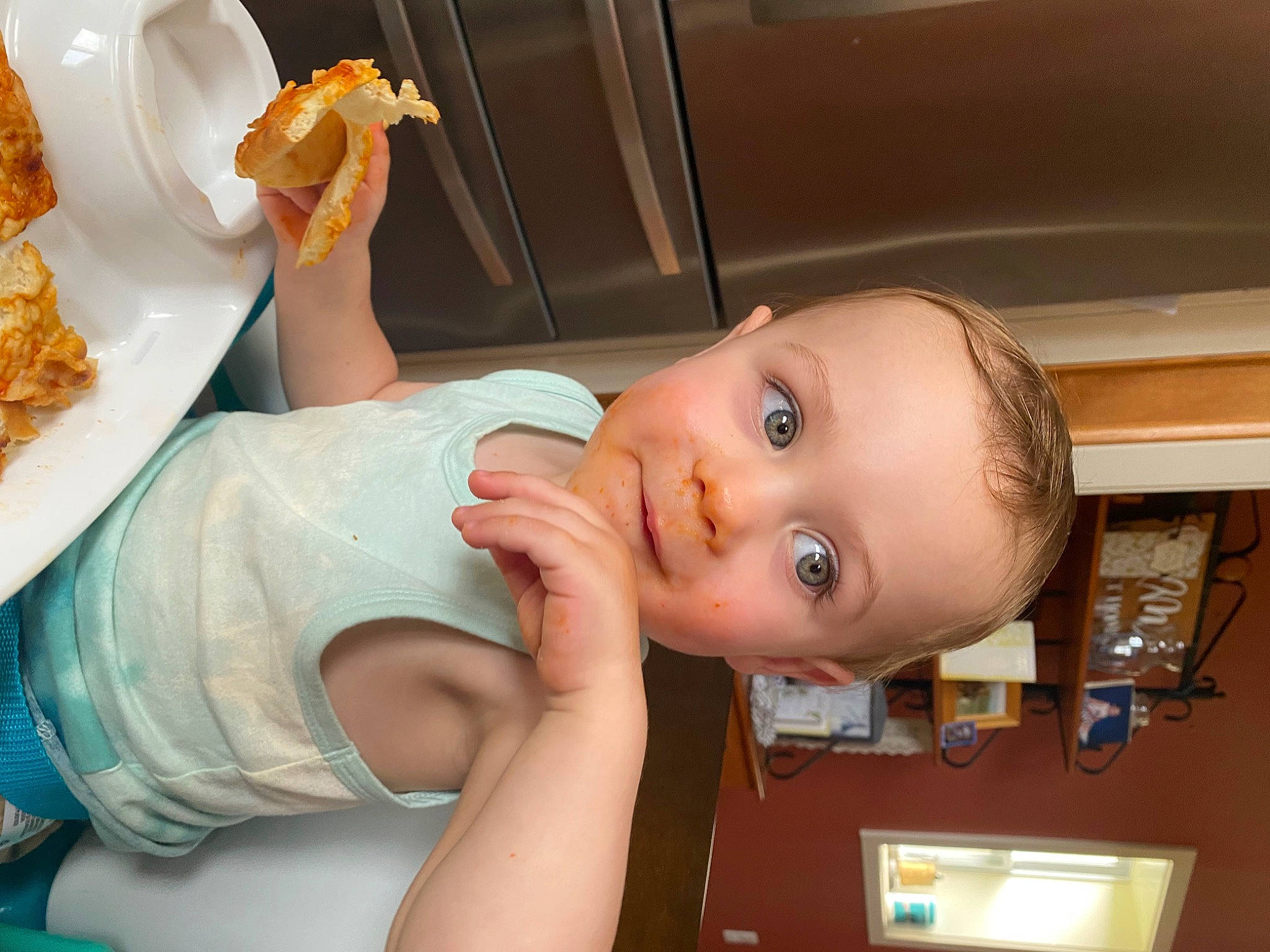 Brady is registered to the contest to win money with this photo: arm, baby, child, comfort_food, cuisine, eyelash, fast_food, finger, finger_food, food, food_craving, fun, happy, ingredient, junk_food, mouth, person, sweetness, tableware, toddler