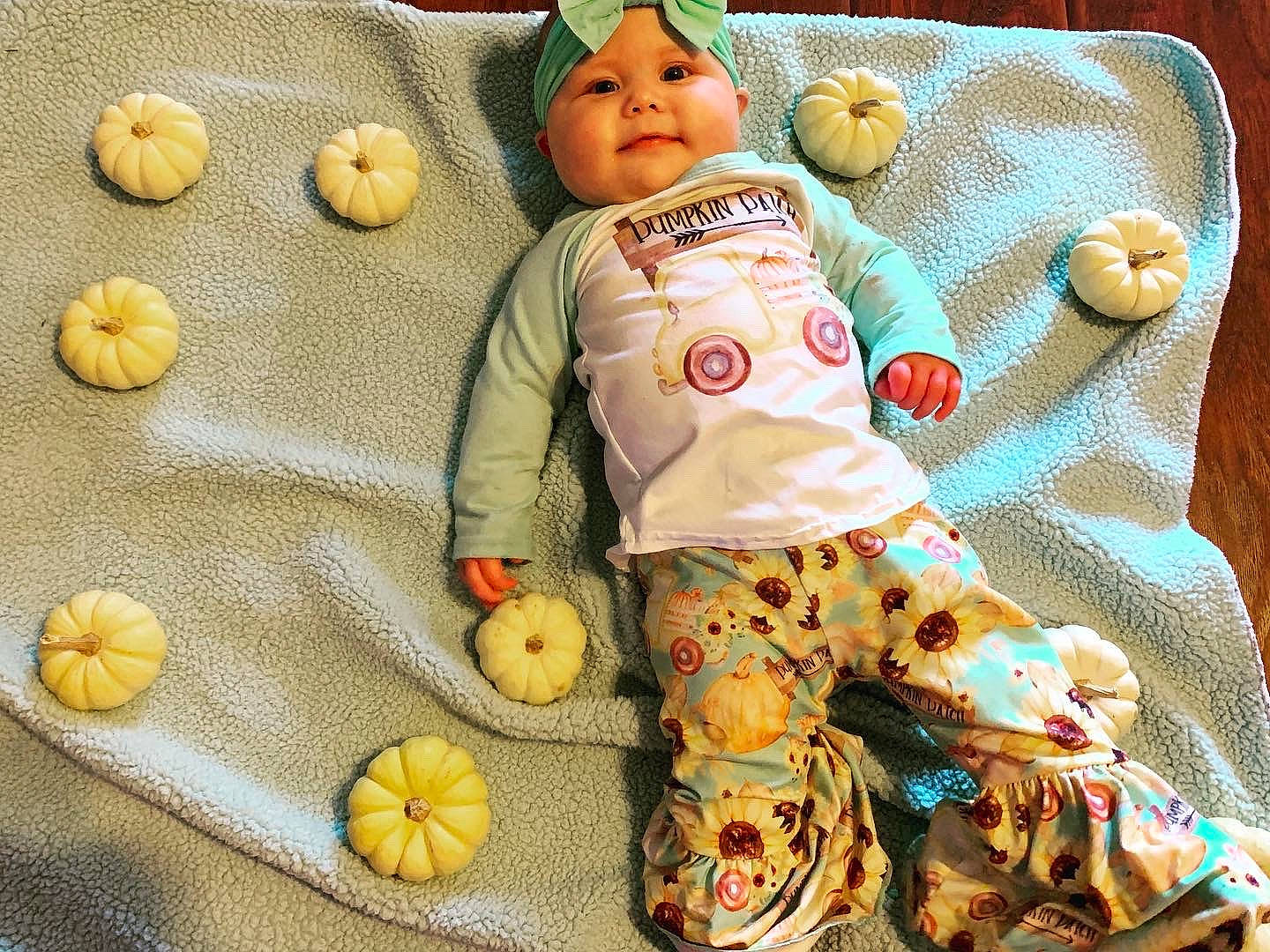 Kayzleigh is registered to the contest to win money with this photo: baby_sleeping, baby_toddler_clothing, baby_toys, bedding, child, comfort, doll, headwear, linens, mammal, orange, pattern, person, plush, room, sleeve, stuffed_toy, textile, toy, vertebrate