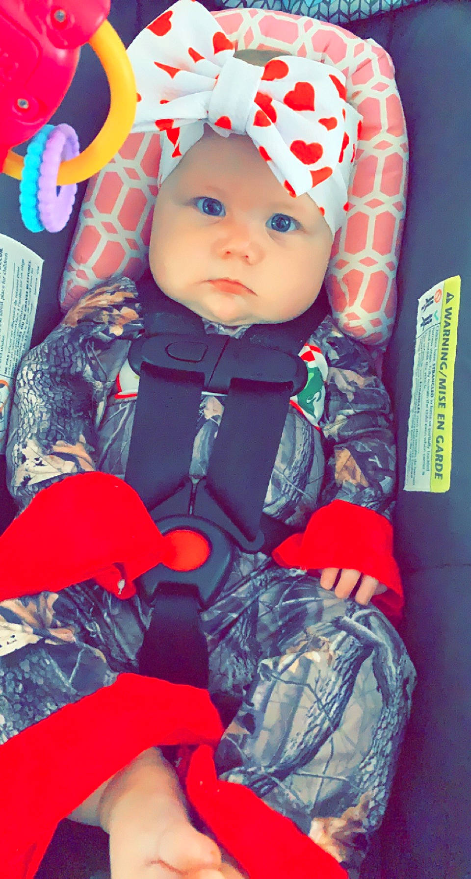 Kayzleigh joined the competition — help win amazing prizes! baby, baby_carriage, baby_products, baby_toddler_clothing, blue, cap, cheek, child, electric_blue, eye, fashion_accessory, headwear, knit_cap, magenta, pattern, person, personal_protective_equipment, pink, red, sleeve