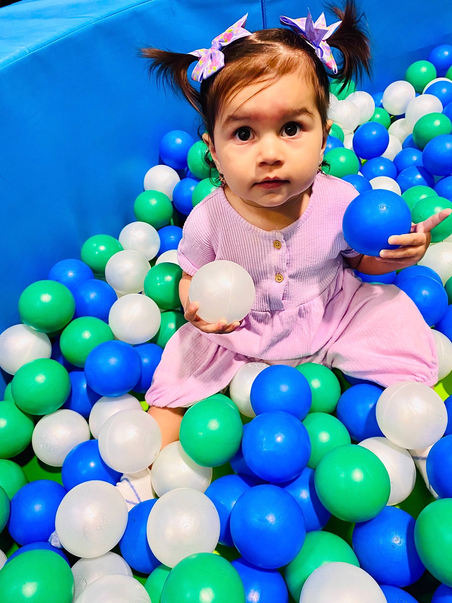 Bianca joined the competition — help win amazing prizes! ball, ball_pit, balloon, blue, child, electric_blue, event, facial_expression, fun, happy, leisure, light, party_supply, person, photograph, product, snapshot, sweetness, toddler, toy