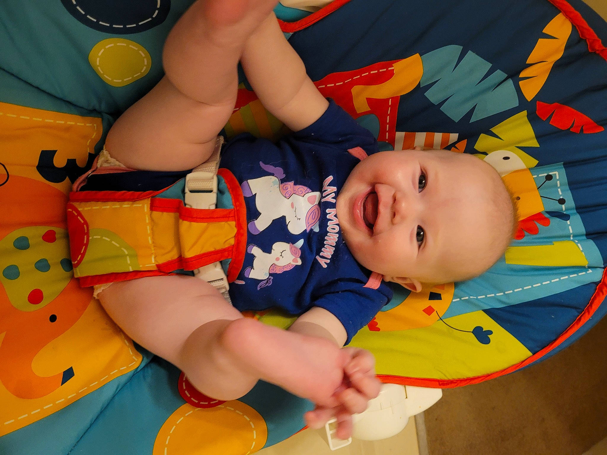 Caroline joined the competition — help win amazing prizes! baby, baby_playing_with_toys, baby_products, baby_toddler_clothing, baby_toys, child, fun, happy, human_leg, joy, leisure, orange, pattern, person, play, product, room, smile, thigh, toddler