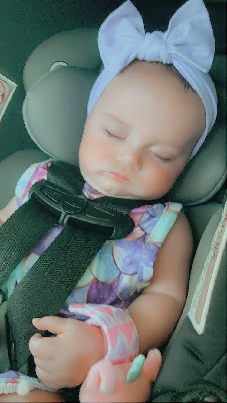 Makenzie is registered to the contest to win money with this photo: baby, baby_products, baby_sleeping, baby_toddler_clothing, cap, cheek, comfort, doll, eyelash, finger, iris, lip, person, pink, product, purple, skin, textile, thumb, toddler