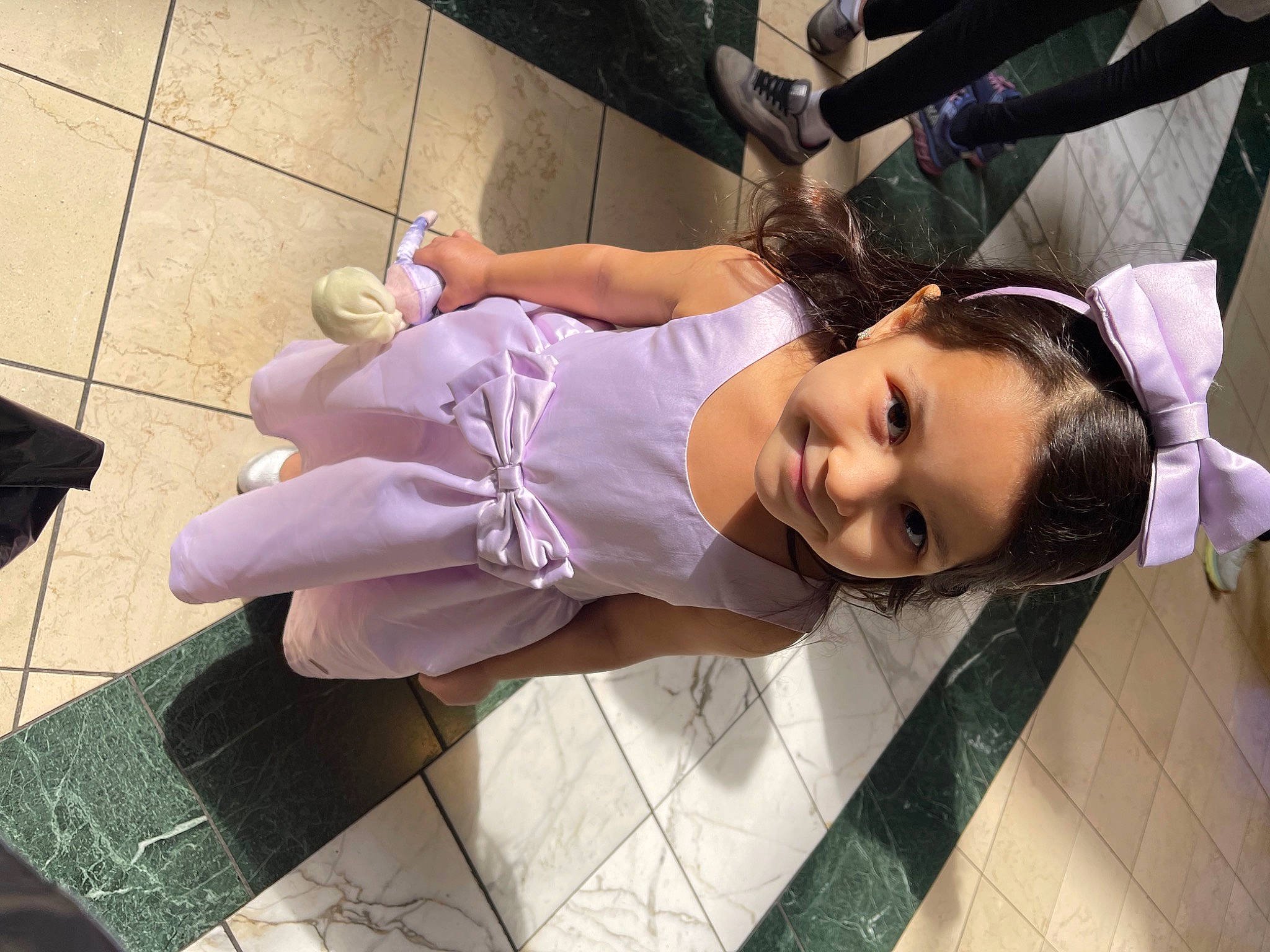 Alexandria is registered to the contest to win money with this photo: child, eyelash, eyewear, flooring, foot, fun, happy, human_leg, joint, joy, knee, leg, leisure, person, purple, sitting, skin, snapshot, street_fashion, thigh