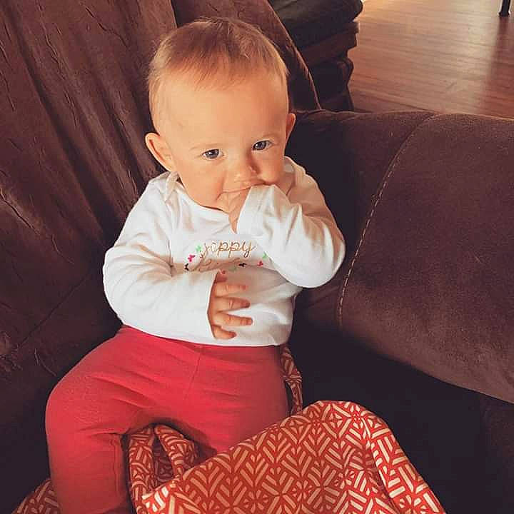 Bella joined the competition — help win amazing prizes! arm, baby, cheek, child, ear, eye, finger, sitting, skin, toddler