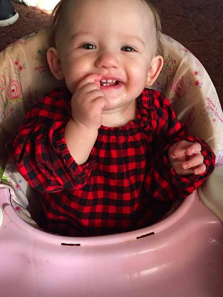 Bella joined the competition — help win amazing prizes! baby, cheek, child, design, face, facial_expression, head, laugh, lip, mouth, nose, pattern, person, plaid, skin, smile, toddler