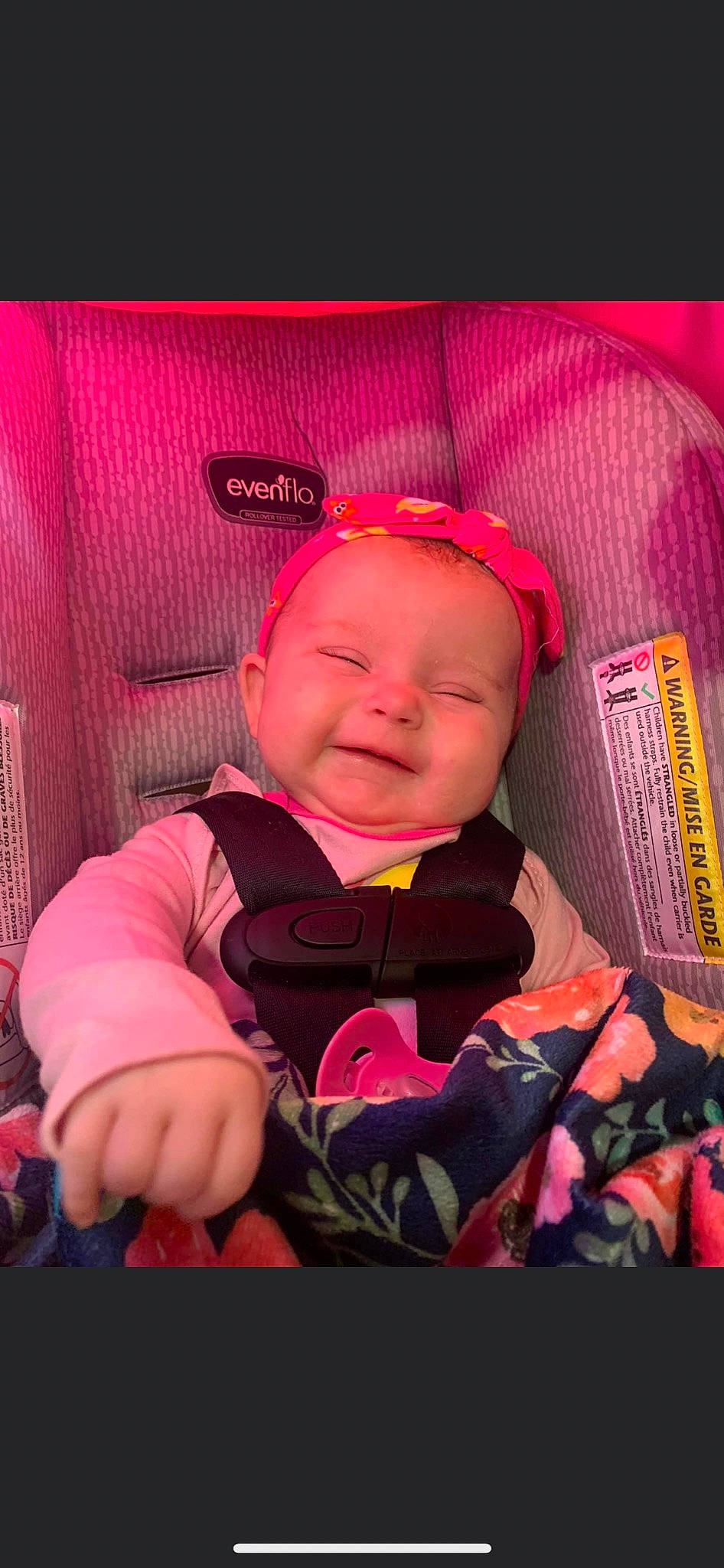 Madi is registered to the contest to win money with this photo: baby, baby_carriage, baby_products, baby_toddler_clothing, cap, car_seat, cheek, child, comfort, cool, fun, happy, magenta, mouth, person, personal_protective_equipment, pink, purple, skin, smile