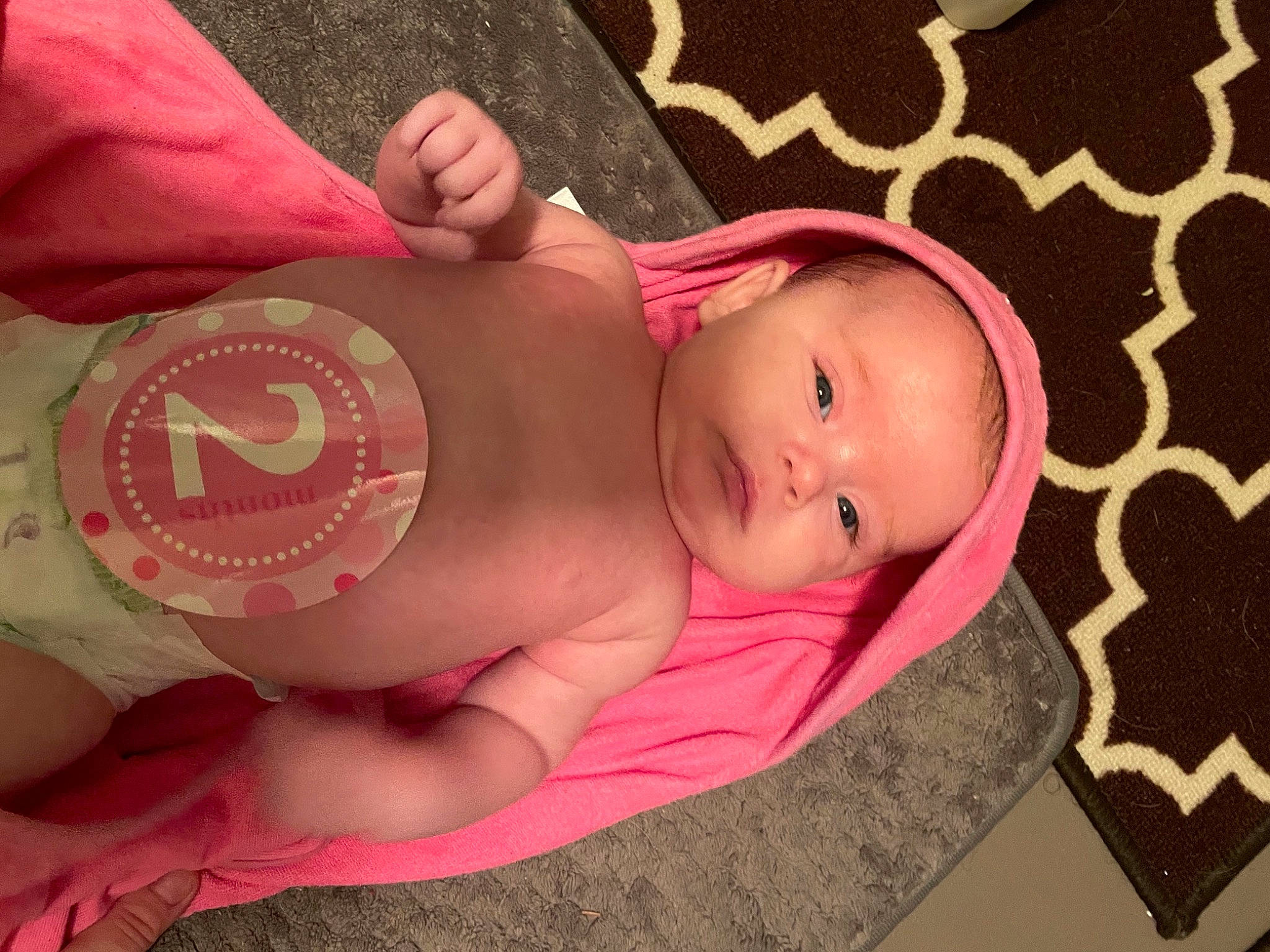 Madi is registered to the contest to win money with this photo: abdomen, baby, baby_products, baby_sleeping, baby_toddler_clothing, cheek, chest, comfort, eye, eyelash, finger, head, human_body, nail, pattern, person, pink, skin, stomach, toddler