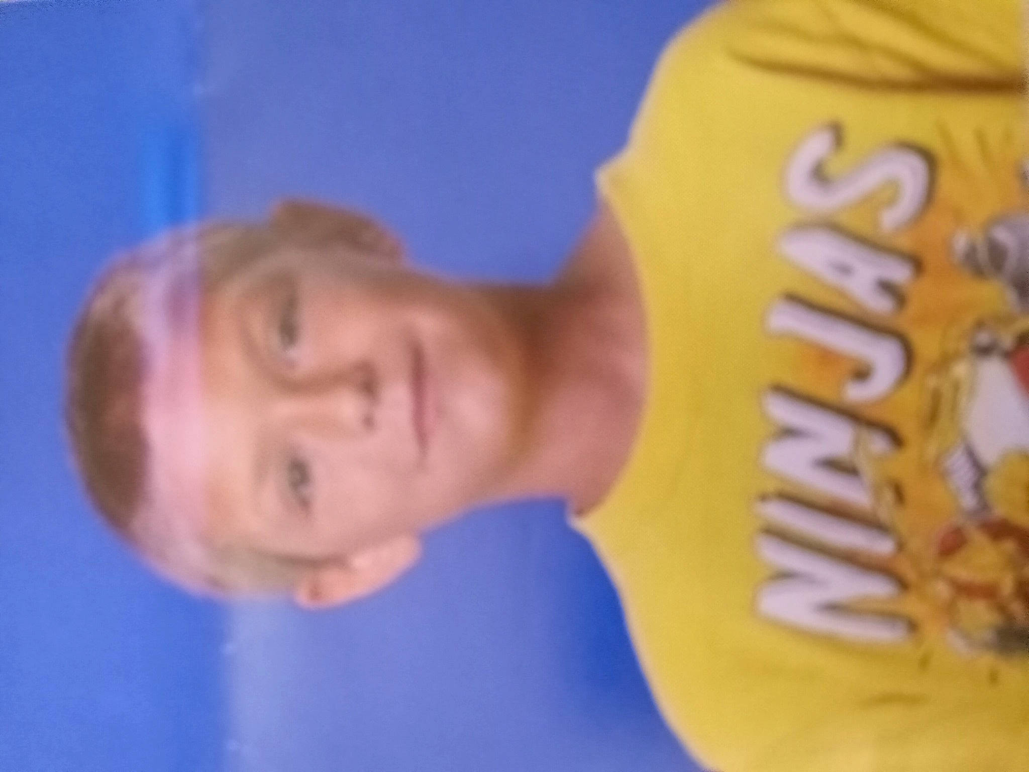 Austin is registered to the contest to win money with this photo: arm, chest, child, elbow, electric_blue, finger, fun, gesture, happy, leisure, organ, person, smile, t_shirt, thumb