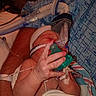 newborn, baby, hospital, medical_equipment, pacifier, blanket, tubes, monitoring, infant, hand, face, patient, healthcare, medical, bed, person, clothing, care, close_up, nursery