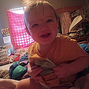 Alyocea is registered to the contest to win money with this photo: bed, bedroom, blanket, casual, child, clothing, curtain, fabric, face, furniture, hair, happy, indoor, light, messy_room, person, room, smiling, toddler, window