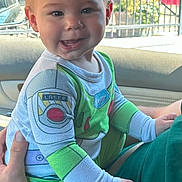 Colton joined the competition — help win amazing prizes! toddler, child, smiling, buzz_lightyear_costume, car_interior, person, happy, green_clothing, window, daylight, hand, seat, face, portrait, cute, sitting, baby, human, casual, indoor