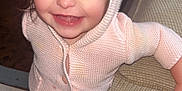 Piper Jay joined the competition — help win amazing prizes! baby, child, clothing, couch, cute, face, floor, golden_shoes, happy, home, hoodie, indoor, knitwear, leaning, person, pink, portrait, small, smiling, toddler