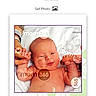 baby, newborn, infant, smiling, blanket, arms_raised, face, skin, head, person, child, watermark, mom_365, digital_interface, thumbnail, navigation_icons, photography, portrait, cute, happy