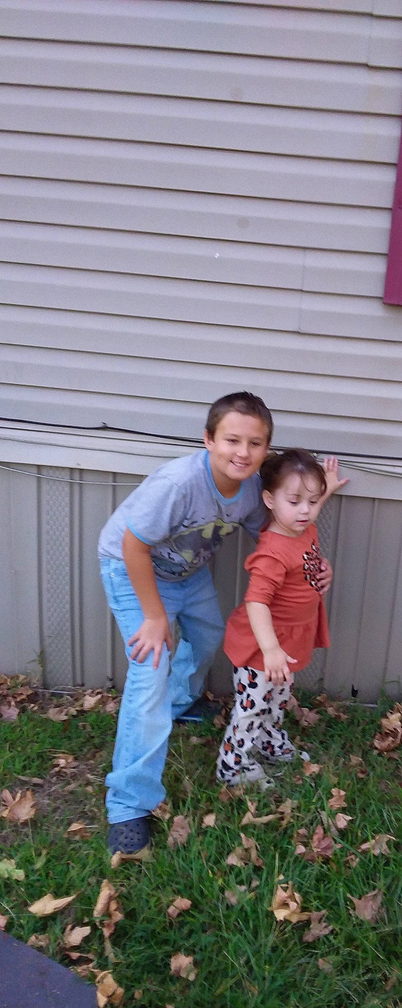 Jessi is registered to the contest to win money with this photo: backyard, child, event, fun, garden, grass, happy, head, joy, leisure, people_in_nature, person, plant, sandal, siding, sitting, smile, soil, t_shirt, toddler