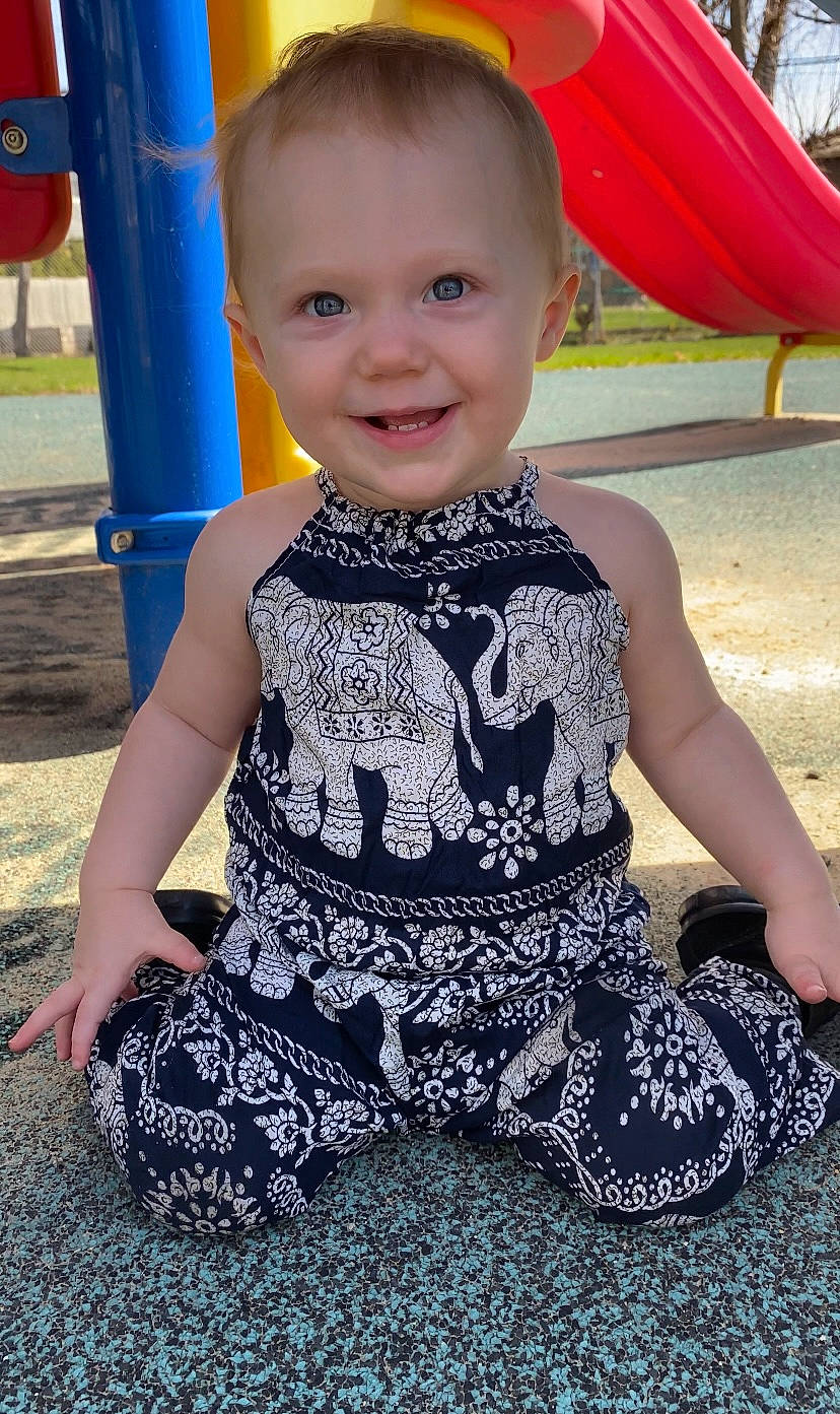 Ava Jane is registered to the contest to win money with this photo: baby_toddler_clothing, blue, child, hairstyle, happy, joy, leg, leisure, organ, people, person, photograph, pink, product, skin, sleeve, smile, summer, t_shirt, thigh