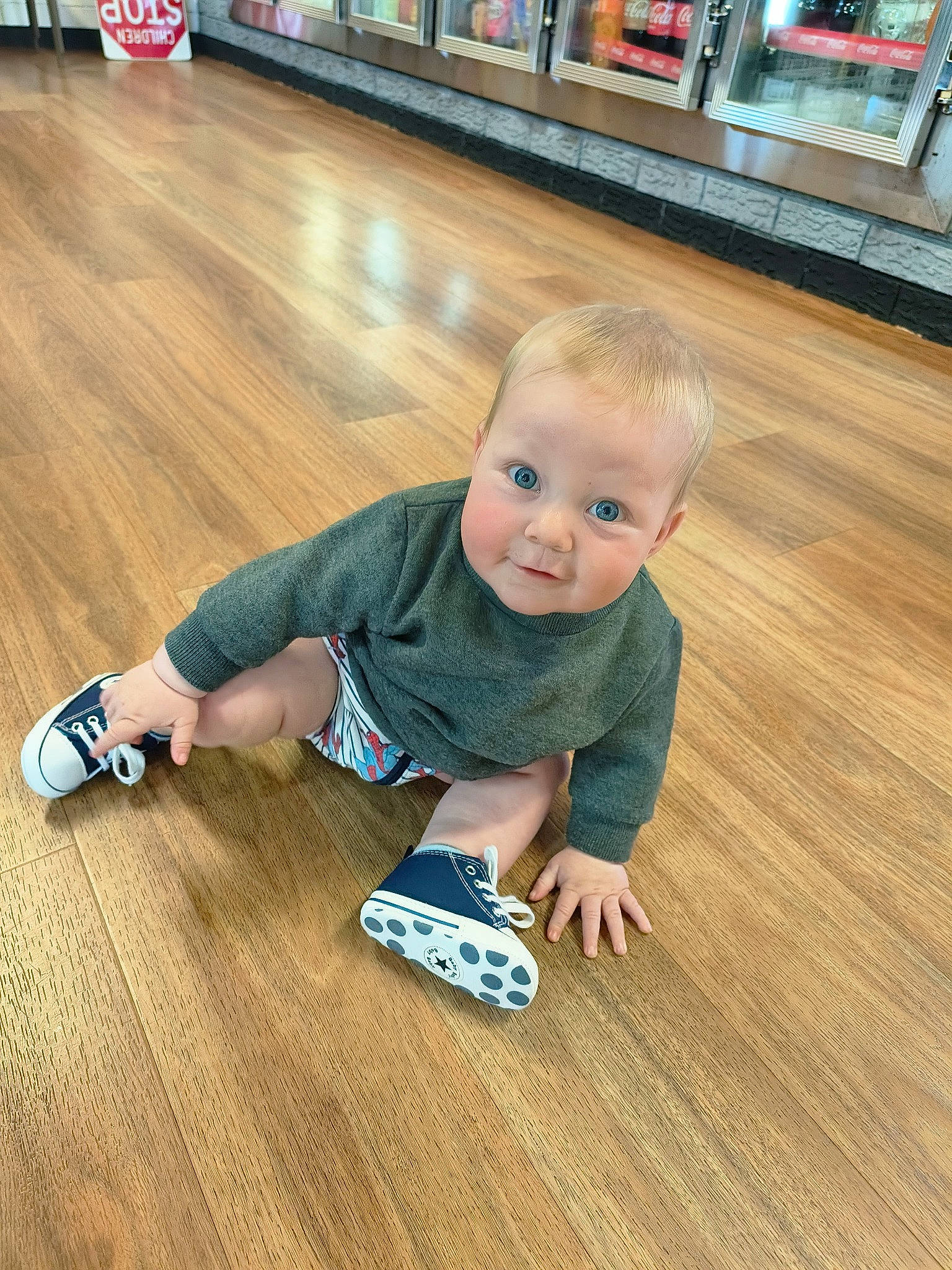 Lachlan is registered to the contest to win money with this photo: baby, baby_toddler_clothing, child, crawling, finger, floor, flooring, fun, happy, hardwood, laminate_flooring, pattern, person, skin, smile, toddler, varnish, watch, wood, wood_flooring