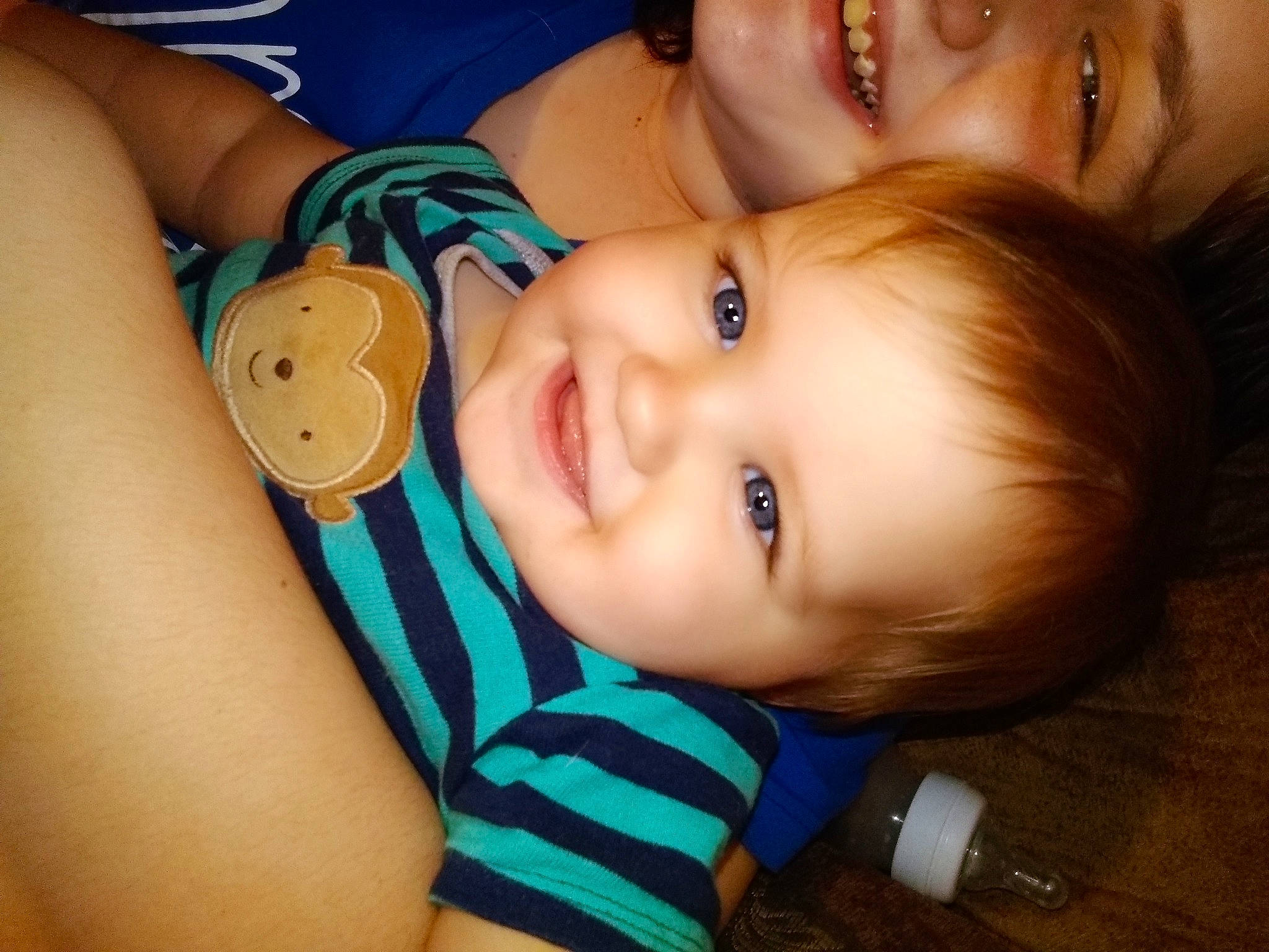 Miles is registered to the contest to win money with this photo: arm, baby, cheek, child, ear, eye, face, finger, happy, joy, lip, mouth, neck, nose, person, selfie, skin, smile, toddler