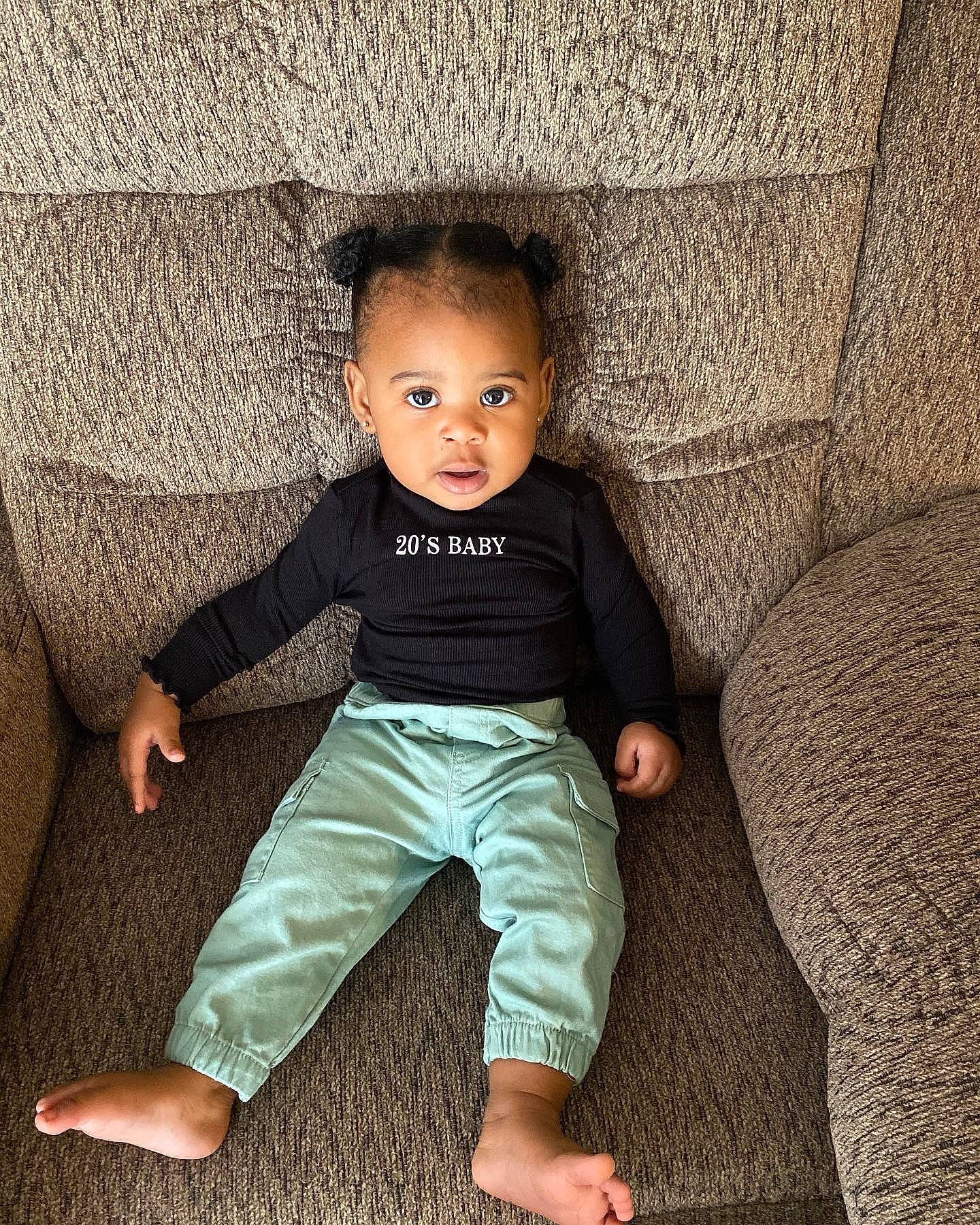 Ahziyah is registered to the contest to win money with this photo: baby, baby_toddler_clothing, child, comfort, eye, flash_photography, floor, flooring, fun, hair, hand, happy, leg, person, sitting, skin, sleeve, t_shirt, tints_and_shades, toddler