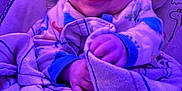 Wade joined the competition — help win amazing prizes! baby, smiling, blanket, pajamas, infant, face, hands, cozy, purple_light, cute, child, portrait, indoors, seat, comfort, soft, happy, expression, closeup, relaxing