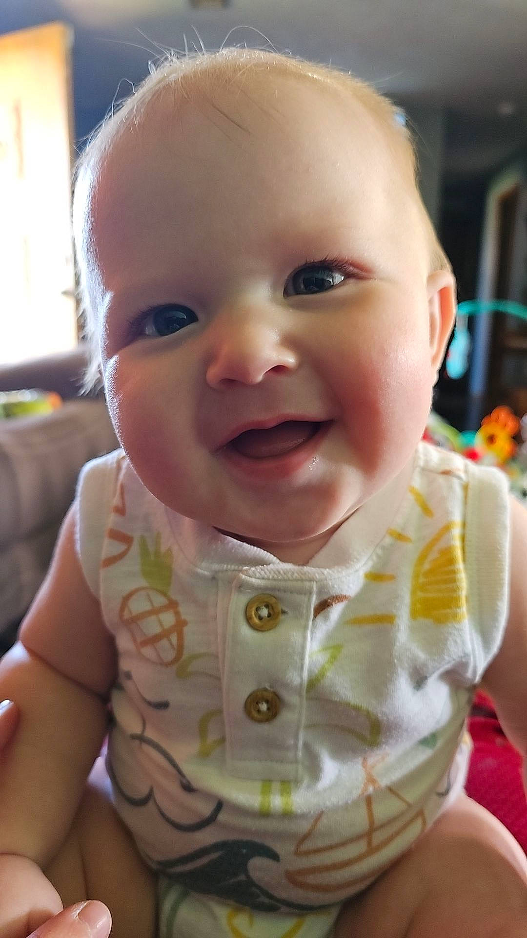 Maverick joined the competition — help win amazing prizes! baby, baby_toddler_clothing, bib, cheek, child, collar, eyelash, fun, happy, iris, pattern, person, sitting, skin, sleeve, smile, toddler