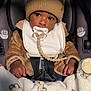 Eastyn is registered to the contest to win money with this photo: baby, beanie, bib, blanket, car_seat, close_up, cute, eyes, hands, indoor, infant, jacket, knit_hat, pacifier, pacifier_clip, portrait, safety_label, seatbelt, soft_toys, toddler