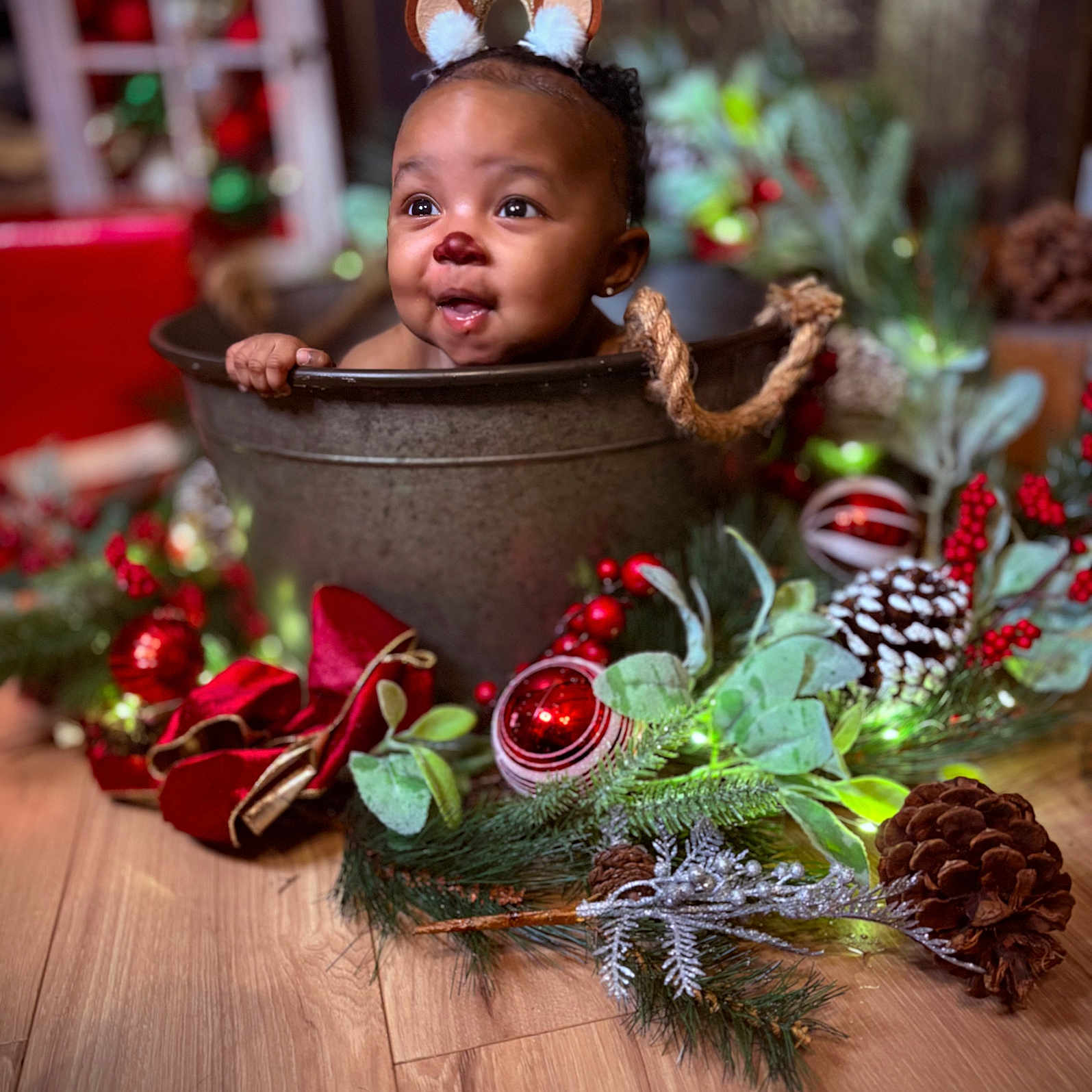 Melodie is registered to the contest to win money with this photo: accessories, baby, bathing, face, flower, flowerarrangement, flowerbouquet, happy, hardwood, head, leaf, person, photography, plant, portrait, pottedplant, rose, smile, tree, wood