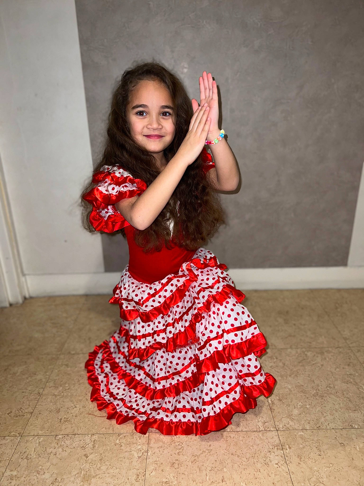 Tamara participe au concours pour gagner de l'argent avec cette photo : black_hair, clothing, day_dress, dress, fashion_design, flash_photography, flooring, formal_wear, happy, joy, leg, long_hair, neck, one_piece_garment, person, shoulder, skin, sleeve, smile, thigh