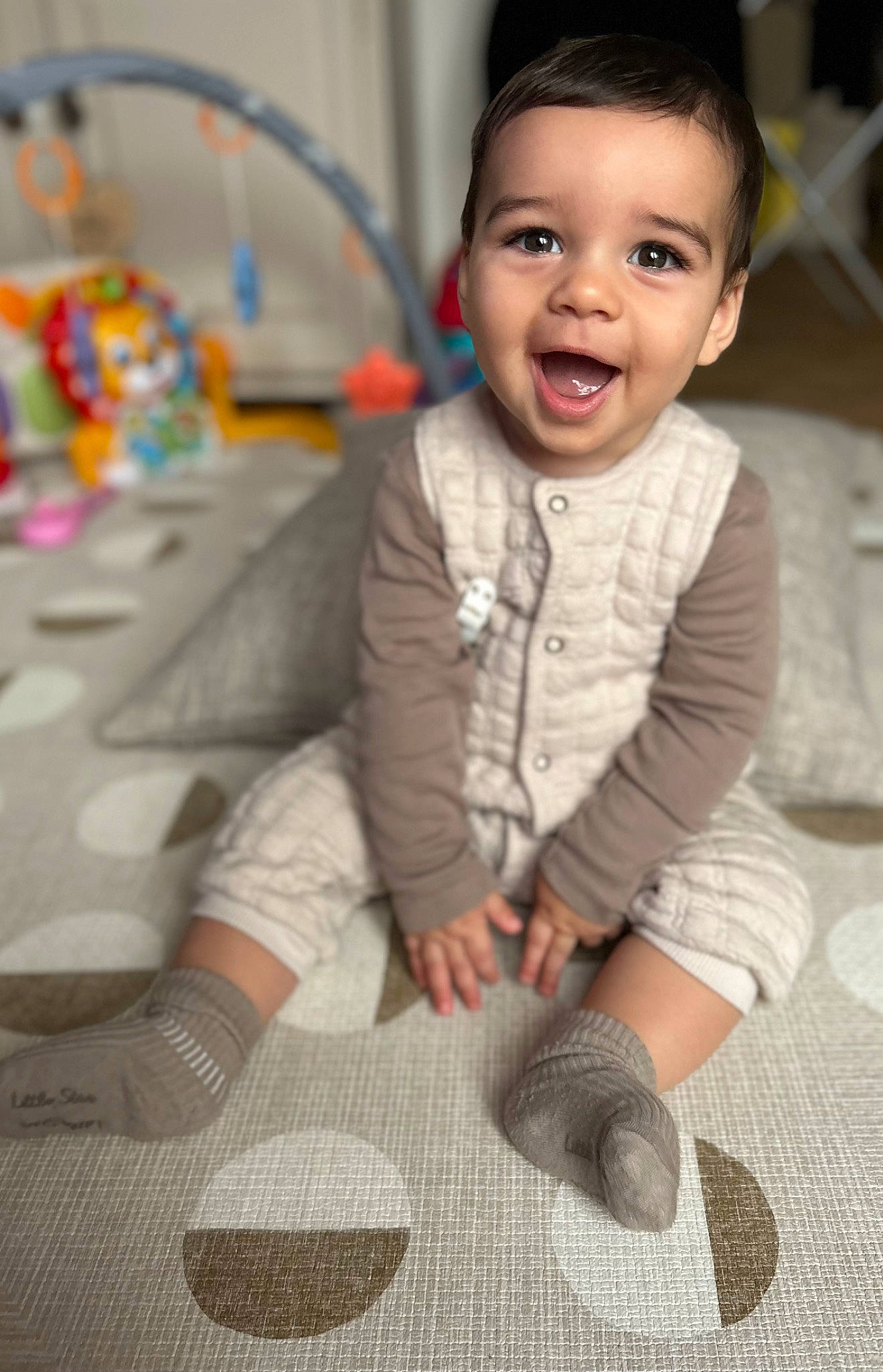 Leo joined the competition — help win amazing prizes! baby, baby_toddler_clothing, cheek, child, comfort, eye, face, flash_photography, flooring, fun, happy, head, pattern, people, person, sitting, skin, sleeve, smile, t_shirt