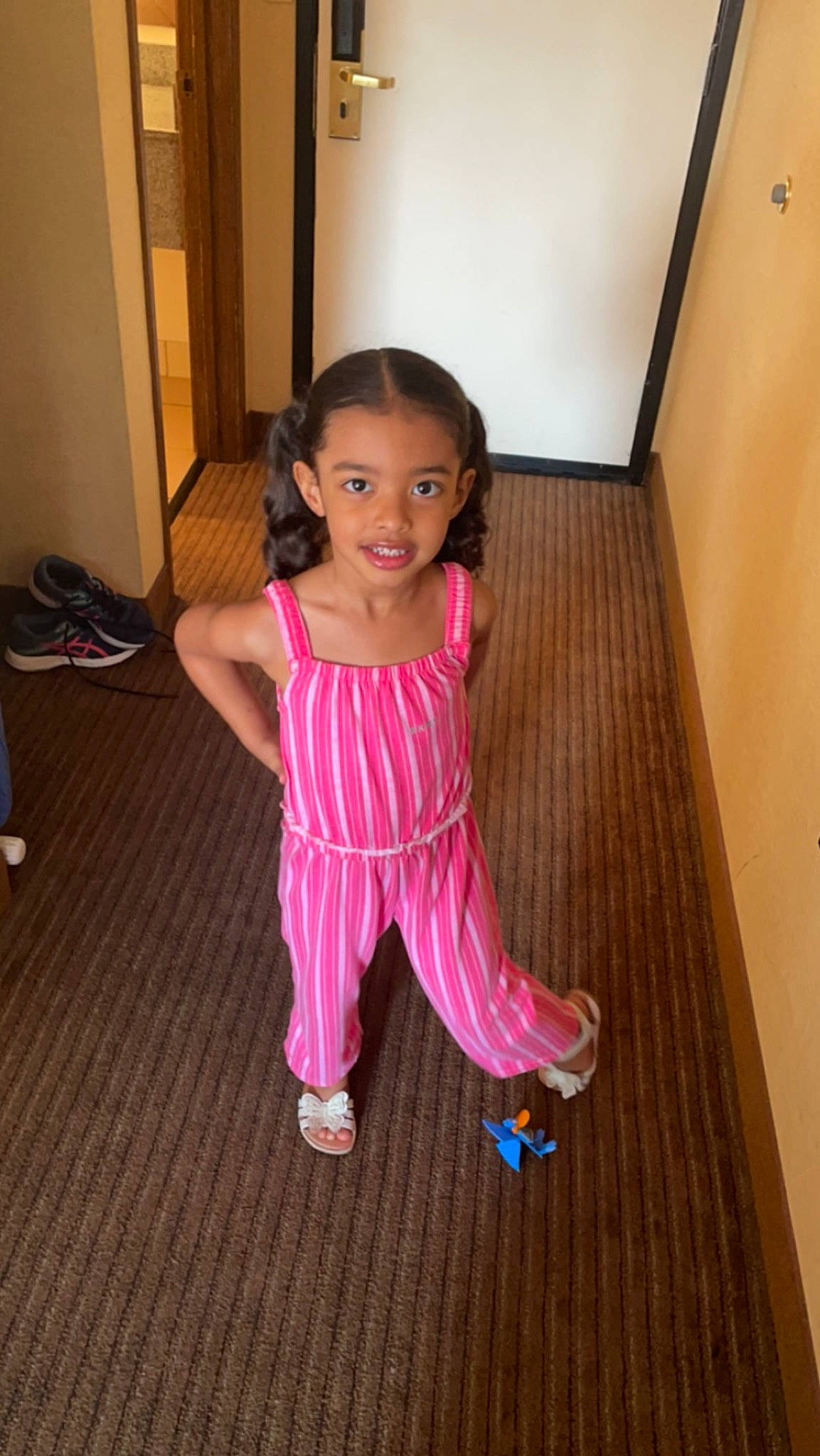 Kaliyah joined the competition — help win amazing prizes! baby_toddler_clothing, floor, flooring, foot, fun, happy, hardwood, human_leg, joy, laminate_flooring, magenta, person, skin, smile, sock, thigh, thumb, toddler, varnish, wood
