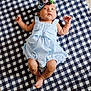 Gianna is registered to the contest to win money with this photo: baby, beachwear, blanket, clothing, face, head, homedecor, infantbed, newborn, person, photography, portrait, quilt, sitting, sleeping, sleeve, sunbathing
