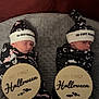 Carter is registered to the contest to win money with this photo: baby, infant, newborn, swaddled, hat, sleeping, halloween, sign, blanket, cushion, soft, cute, holiday, celebration, resting, two, bedroom, decor, peaceful, portrait